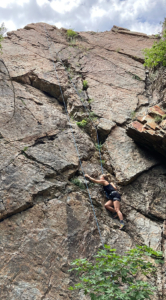 justine rock climbing